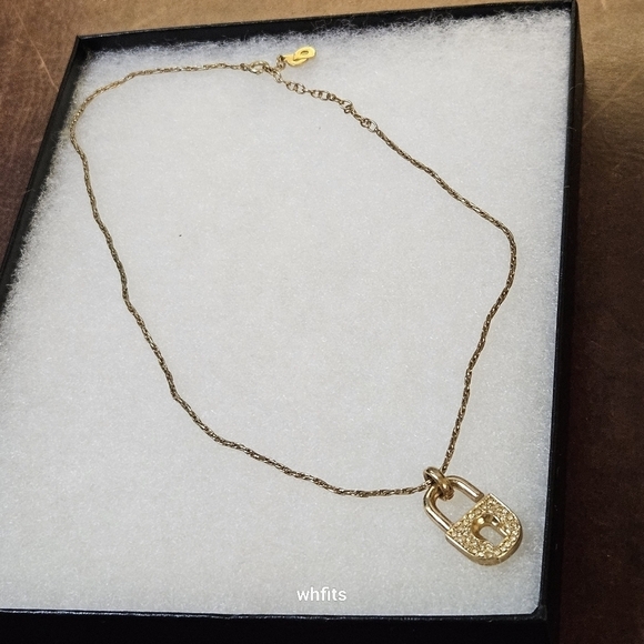 Dior Jewelry - Christian Dior Cadena Lock Motif Rhinestone Gold Tone Pendant Necklace
